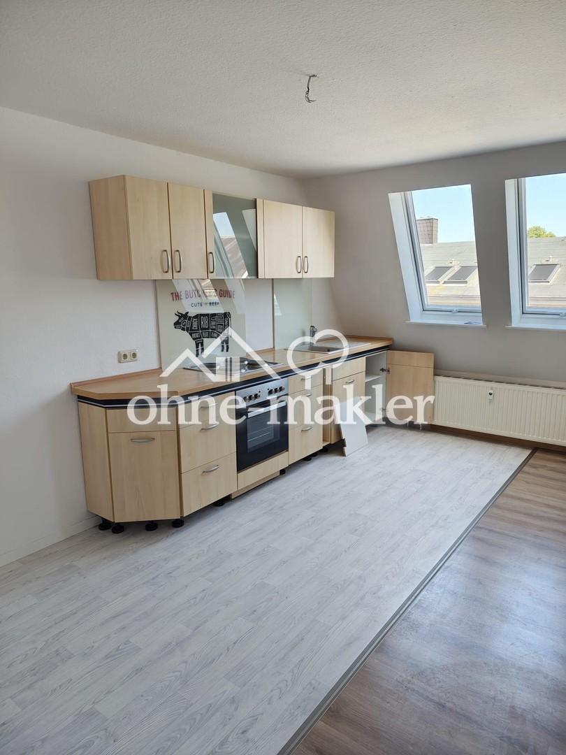 Helle 2-Zimmer-Dachgeschosswohnung mit großer Wohnküche in Fürstenwalde/Spree - Photo 2