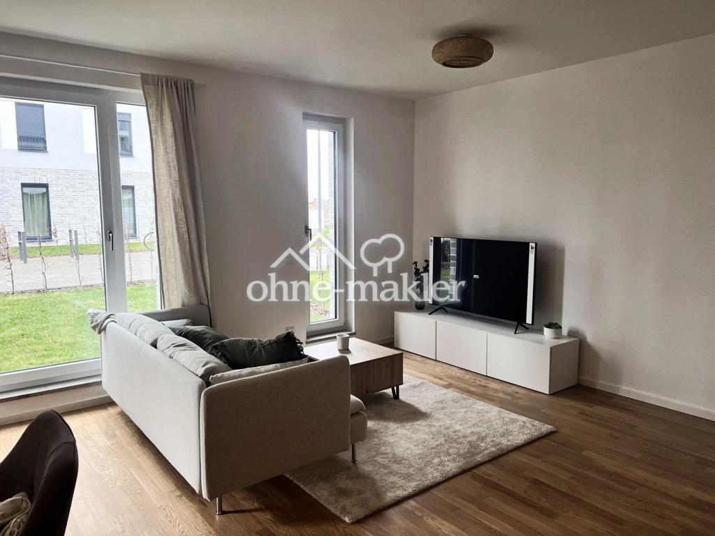 Erstbezug/Neubau Stilvoll eingerichtete Erdgeschosswohnung mit Garten - Photo 1