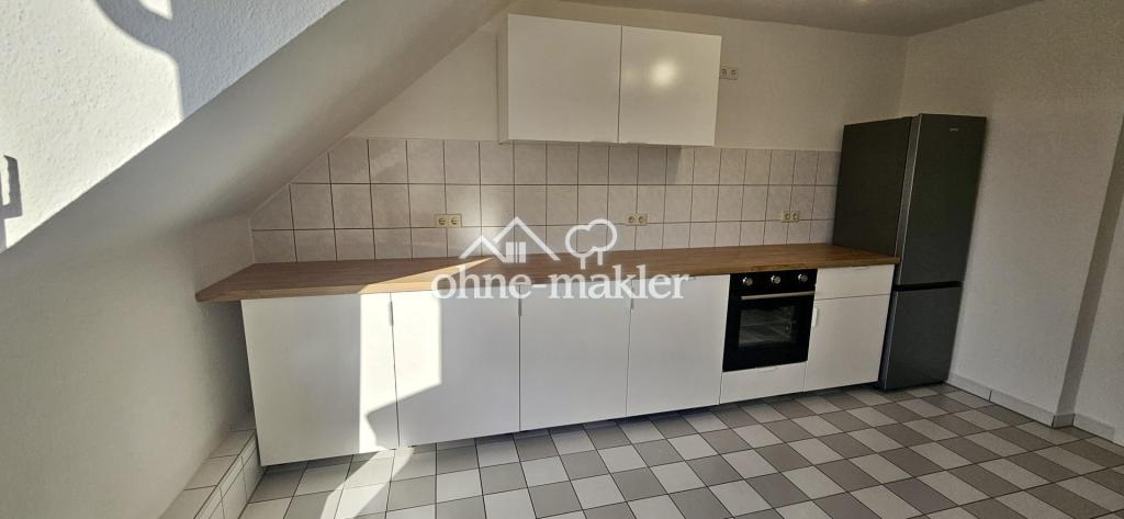 Geräumige 3-Zimmer-DG-Wohnung mit Wohnküche, neuer EBK und Balkon in Eller - Foto 2