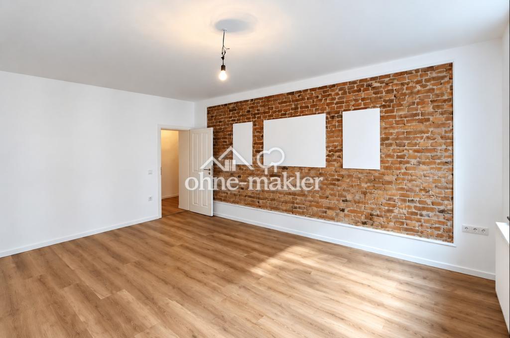 Stilvoll sanierte 3-Zimmer-Wohnung mit Kaminofen, Sichtziegelwänden & hochwertigem Bad - Foto 4