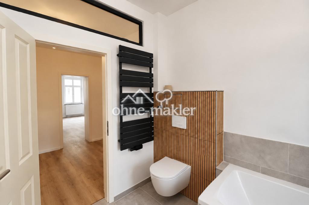 Stilvoll sanierte 3-Zimmer-Wohnung mit Kaminofen, Sichtziegelwänden & hochwertigem Bad - Foto 5