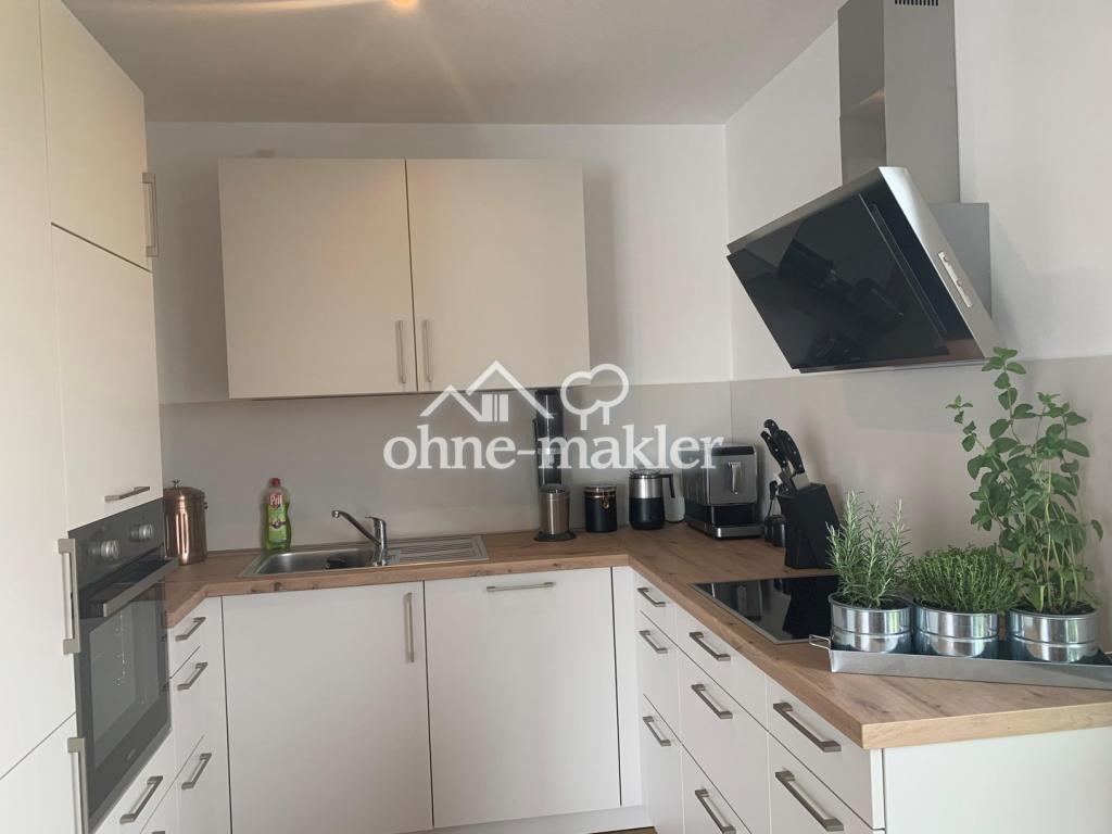 Großzügige 3-Zimmer-Wohnung mit 27 m² Dachterrasse und Einbauküche in zentraler Lage von Bayerbach - Foto 2