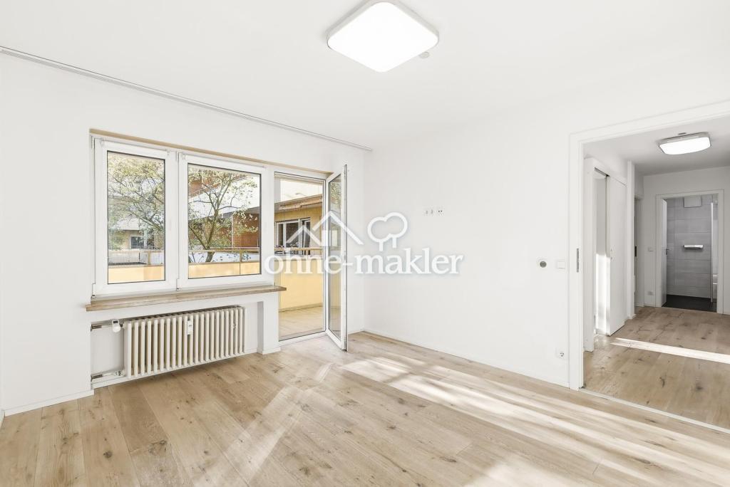 Helle 2,5-Zimmer-Wohnung mit großem Südwestbalkon und EBK - Foto 1