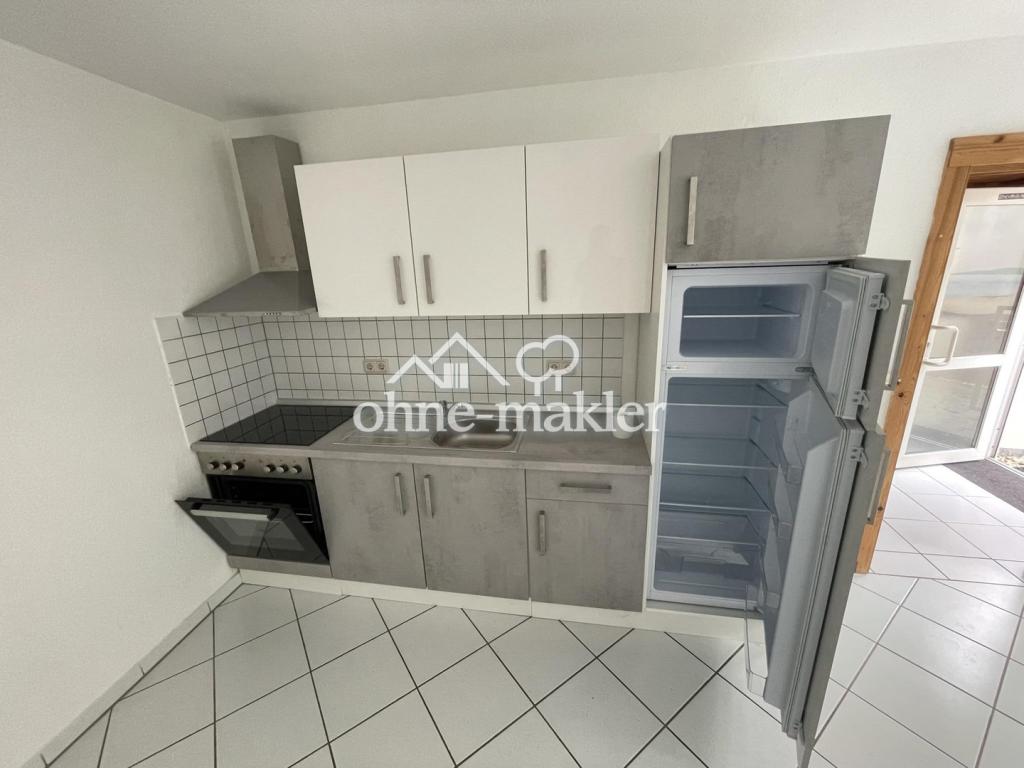 Attraktive 1-Zimmerwohnung mit Terrasse, Einbauküche, Stellplatz & Keller - Photo 4