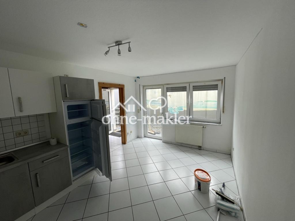 Attraktive 1-Zimmerwohnung mit Terrasse, Einbauküche, Stellplatz & Keller - Photo 2