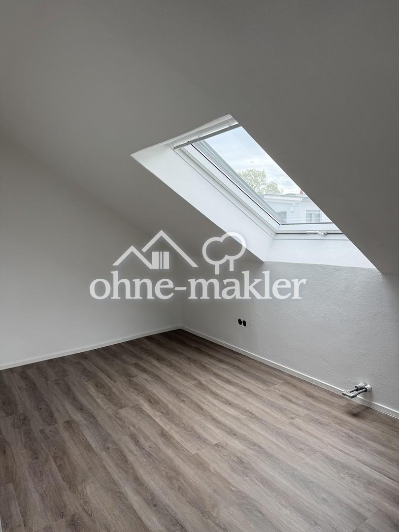 Stilvolle, kernsanierte 1,5-Zimmer-Dachgeschosswohnung in zentraler und ruhiger Lage von Eching - Photo 4