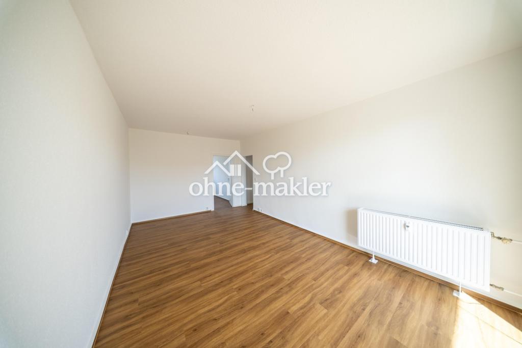 Erstbezug nach Komplettsanierung – 4-Zi.-Wohnung mit Balkon & neuer Klimaanlage in Bitterfeld - Foto 3