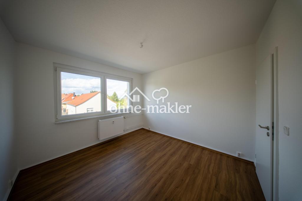 Erstbezug nach Komplettsanierung – 4-Zi.-Wohnung mit Balkon & neuer Klimaanlage in Bitterfeld - Foto 4
