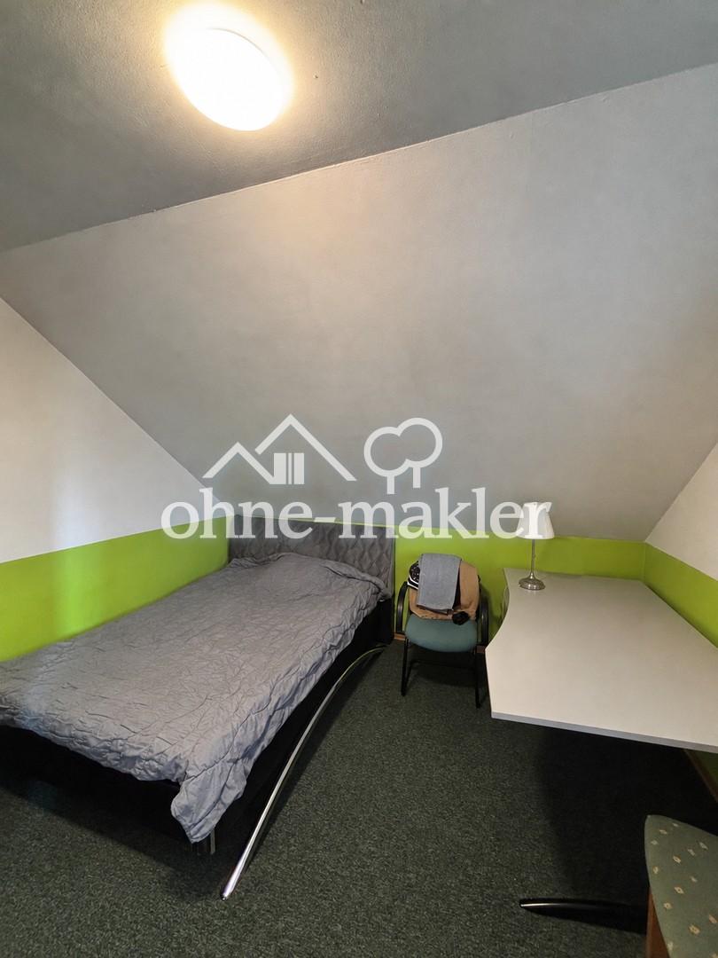 Gemütliche Dachgeschosswohnung mit Balkon - Foto 1