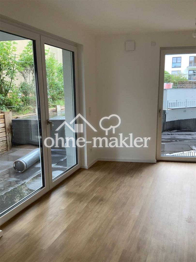 Moderne 1-Zimmer-Wohnung mit Terrasse und eigenem Gartenanteil - Foto 2