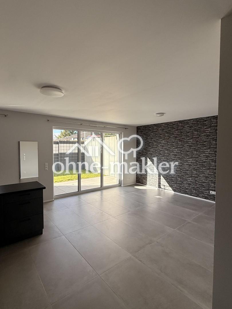 Moderne 65m² Wohnung mit Terrasse & Gartenanteil - Foto 1