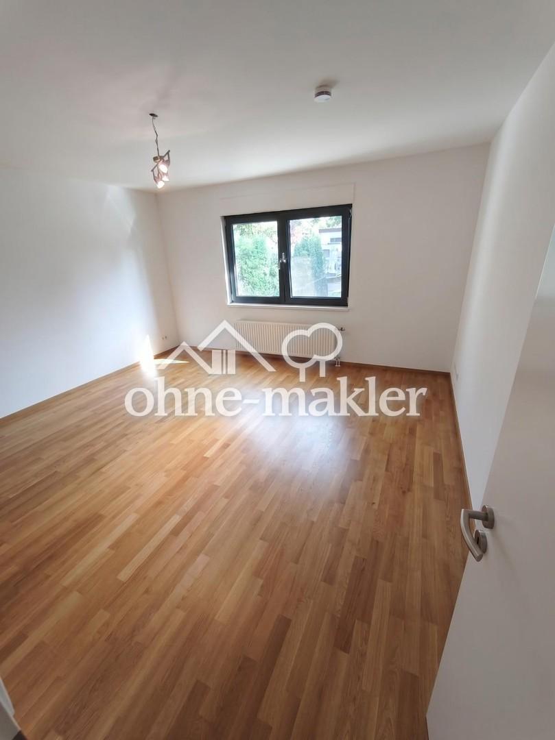 Wohnen wie im Haus: sanierte 3-Zimmer-Wohnung mit Kamin, Südterrasse, Garten & Tiefgarage - Foto 3