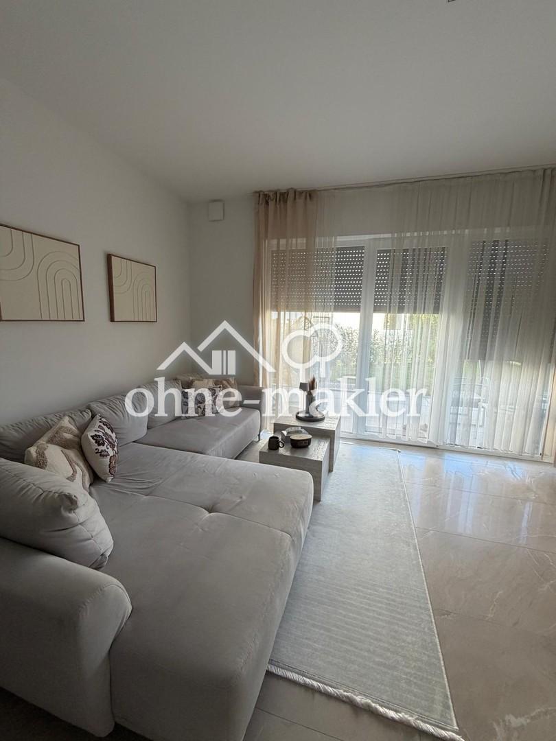 Schöne 3 Zimmer-Wohnung mit Garten im Neubau - Foto 3