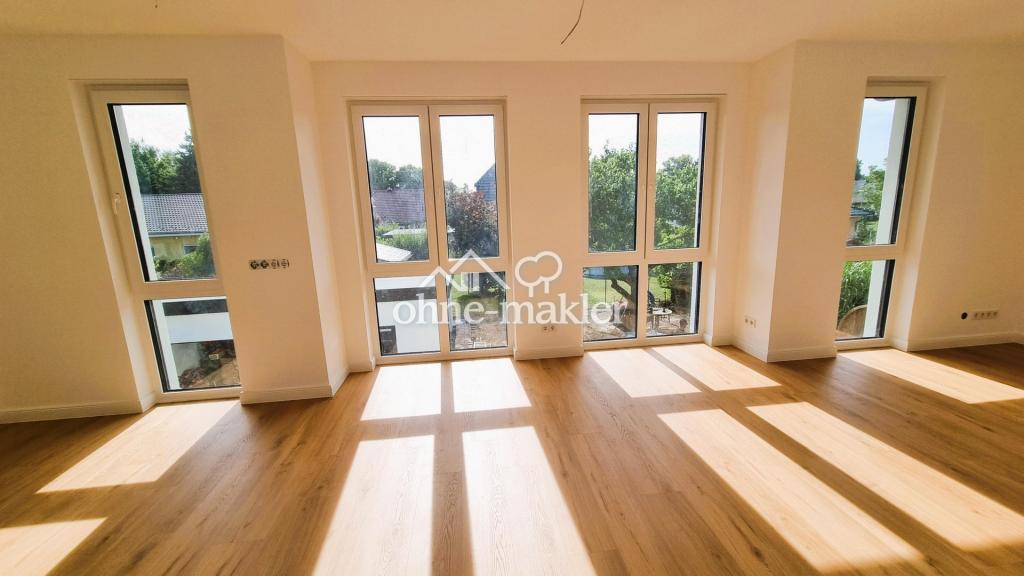 Erstbezug im Grünen: Exklusive 3,5-Zi.-Wohnung mit Premium-EBK & privatem Garten - Foto 1