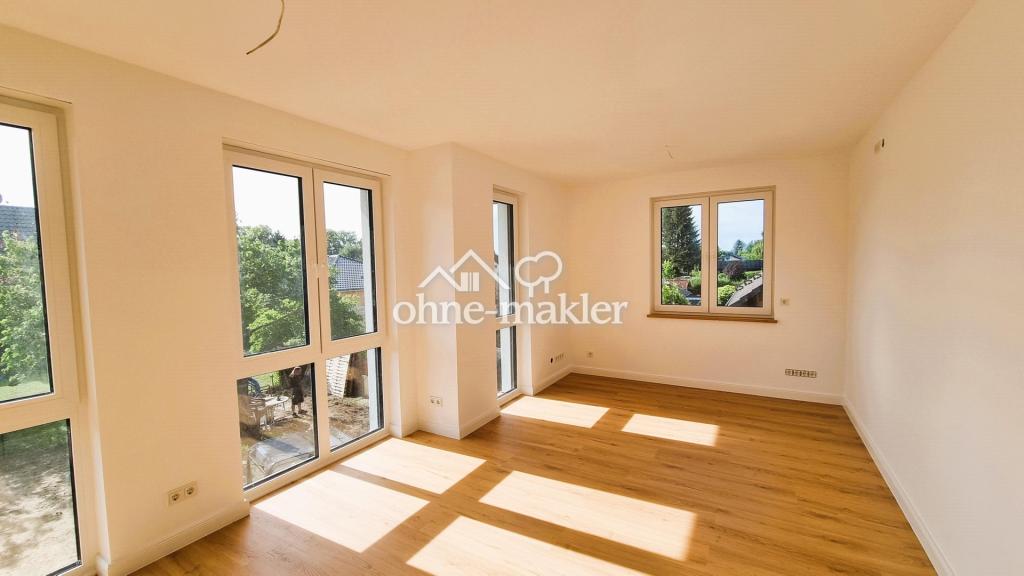 Erstbezug im Grünen: Exklusive 3,5-Zi.-Wohnung mit Premium-EBK & privatem Garten - Foto 2