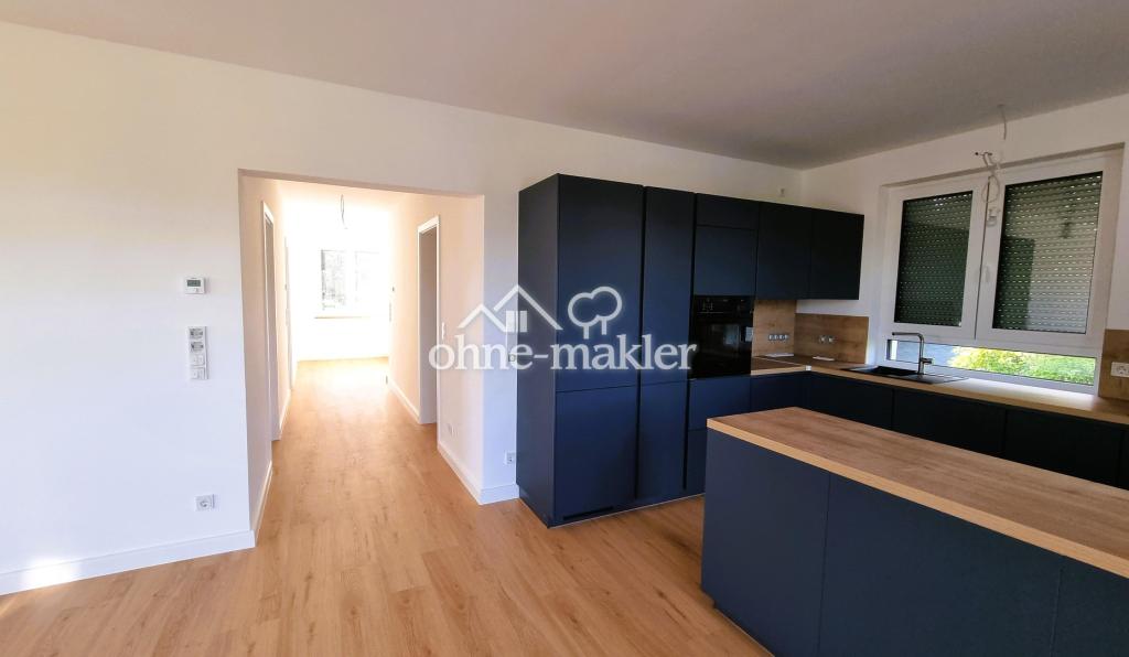 Erstbezug im Grünen: Exklusive 3,5-Zi.-Wohnung mit Premium-EBK & privatem Garten - Foto 3