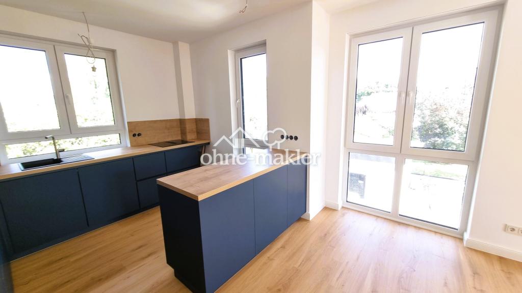 Erstbezug im Grünen: Exklusive 3,5-Zi.-Wohnung mit Premium-EBK & privatem Garten - Foto 4