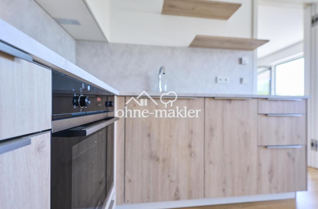 Neubau: Helle und ruhige Zwei-Zimmer-Wohnung mit luxuriöser Innenausstattung mit Balkon und EBK - Photo 4