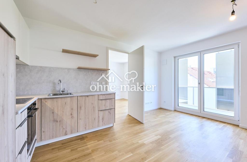 Neubau: Helle und ruhige Zwei-Zimmer-Wohnung mit luxuriöser Innenausstattung mit Balkon und EBK - Photo 2