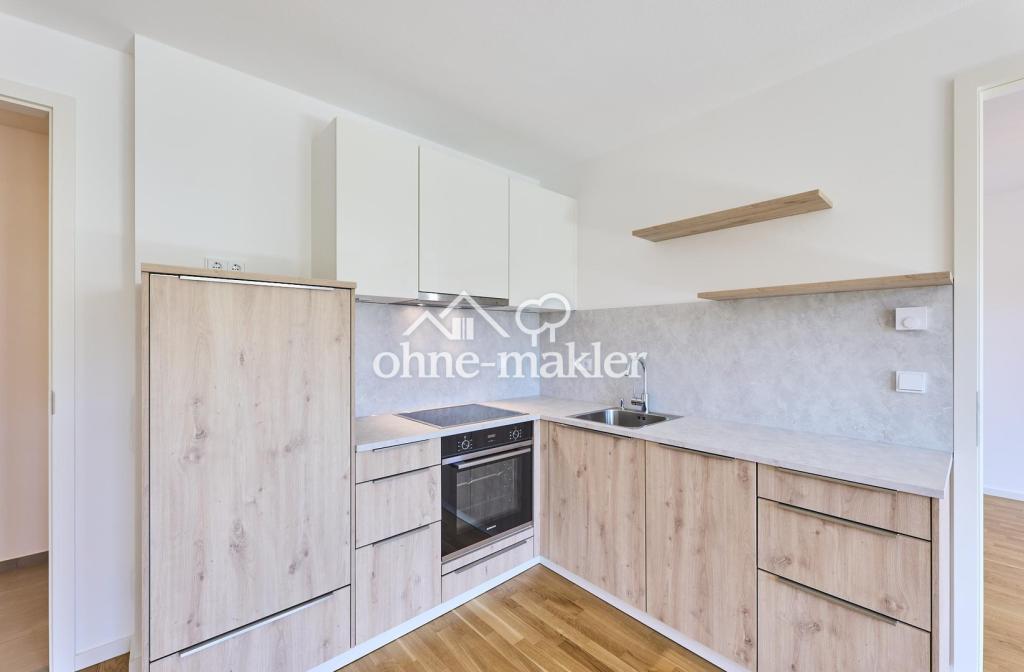 Neubau: Helle und ruhige Zwei-Zimmer-Wohnung mit luxuriöser Innenausstattung mit Balkon und EBK - Photo 3