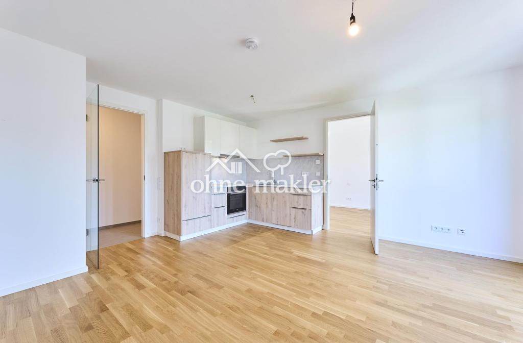 Neubau: Helle und ruhige Zwei-Zimmer-Wohnung mit luxuriöser Innenausstattung mit Balkon und EBK - Foto 2