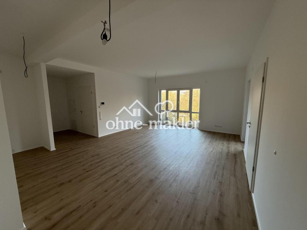 Moderne 2-Zimmer-Neubauwohnung 2026 mit Balkon & Blick ins Grüne in zentraler Lage - Foto 1