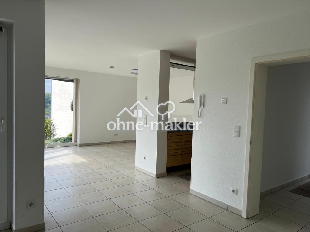 Exklusive Terrassenwohnung mit traumhaftem Grünblick, großer Fensterfront & Garage - Foto 2