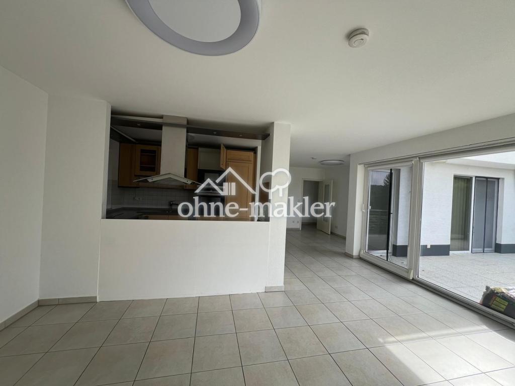 Exklusive Terrassenwohnung mit traumhaftem Grünblick, großer Fensterfront & Garage - Foto 4