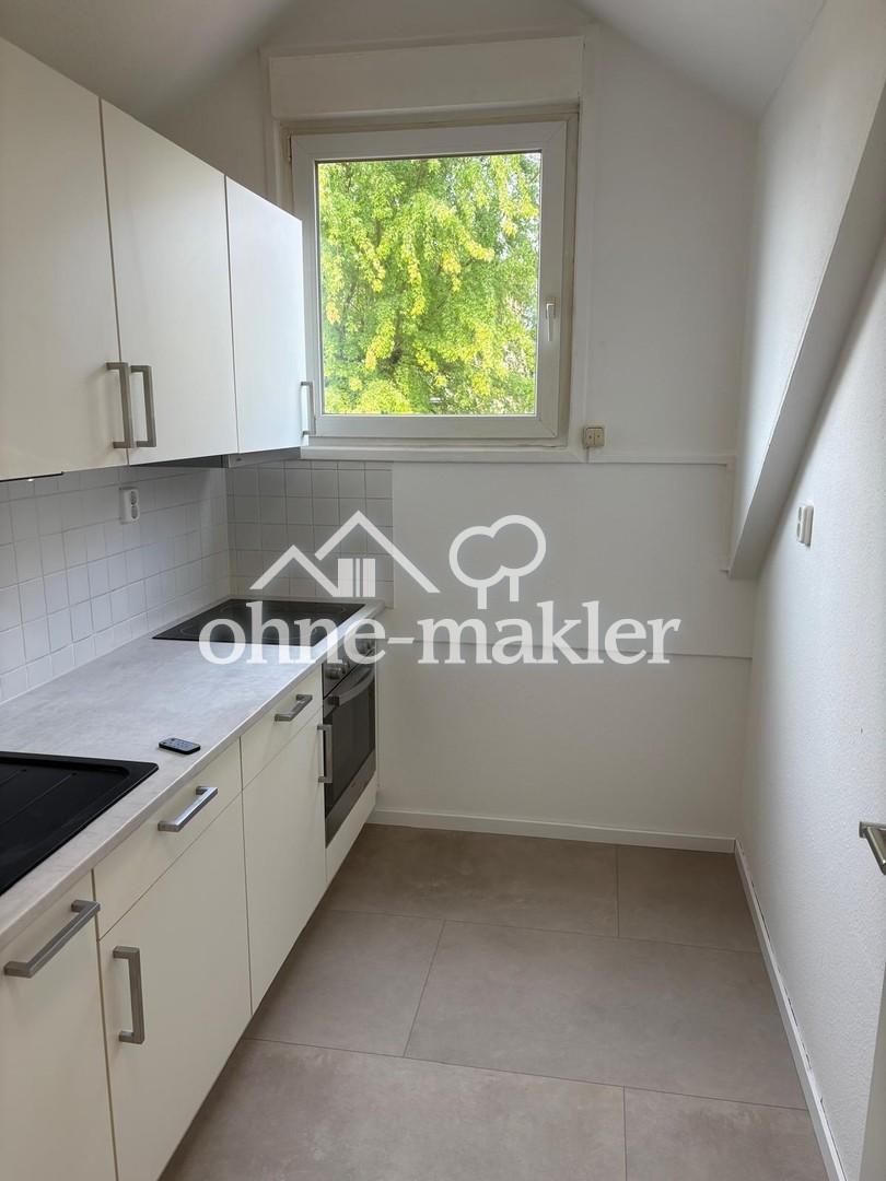 Helle ruhige 2 Zimmer Dachwohnung im 1.OG mit Blick ins Grüne, Einbauküche, großer Balkon - Foto 3