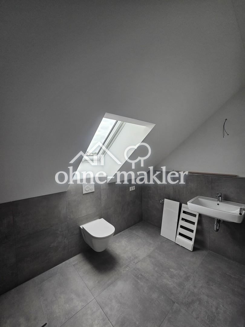 Erstbezug DG Wohnung im neuen 8-Familienhaus nach KFW 40 Standard - Foto 1