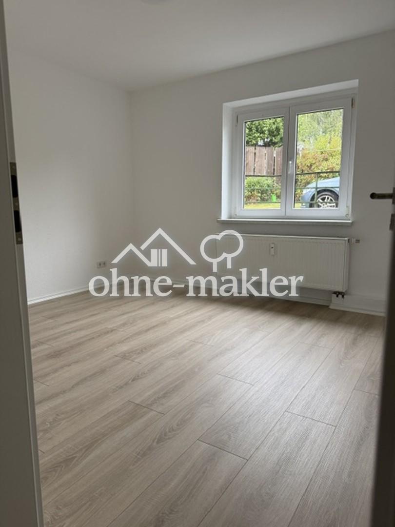 Sanierte Erdgeschosswohnung mit Terrasse - Foto 1