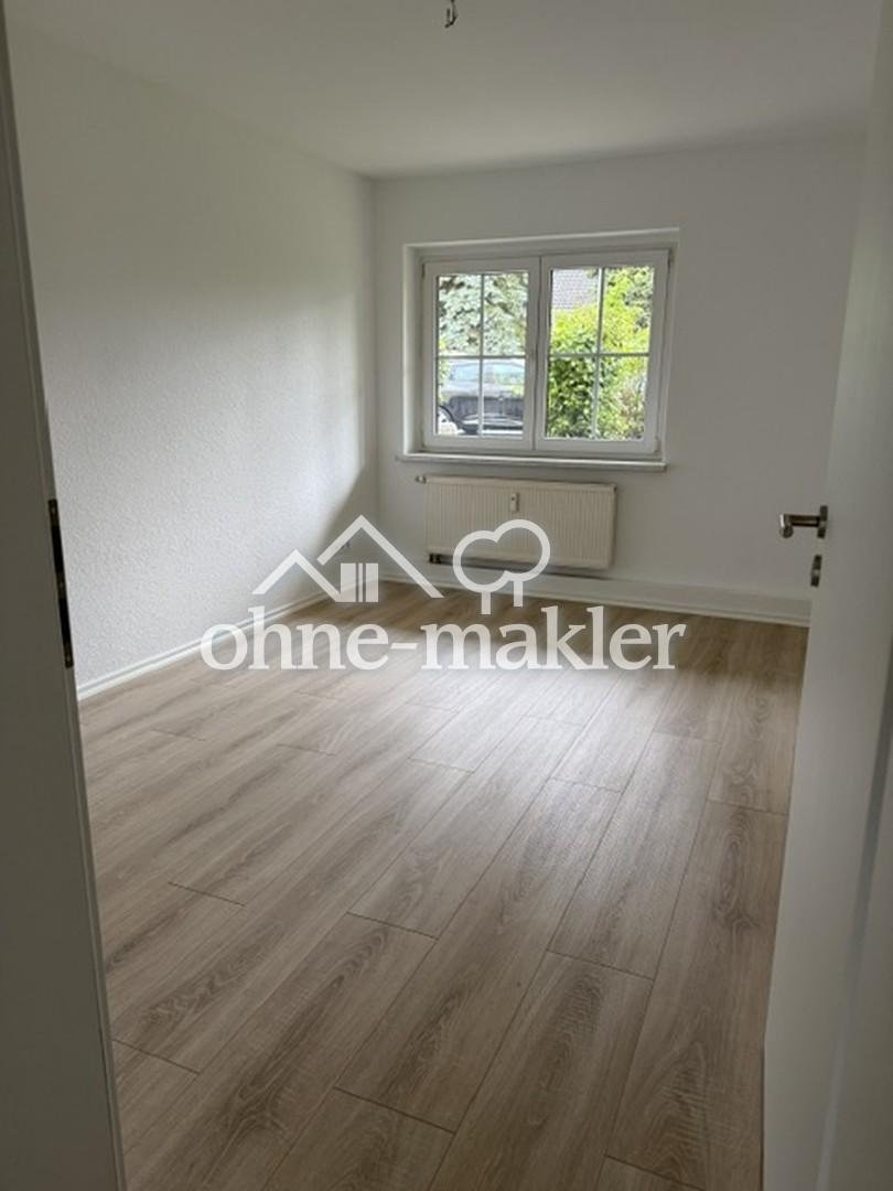 Sanierte Erdgeschosswohnung mit Terrasse - Foto 5