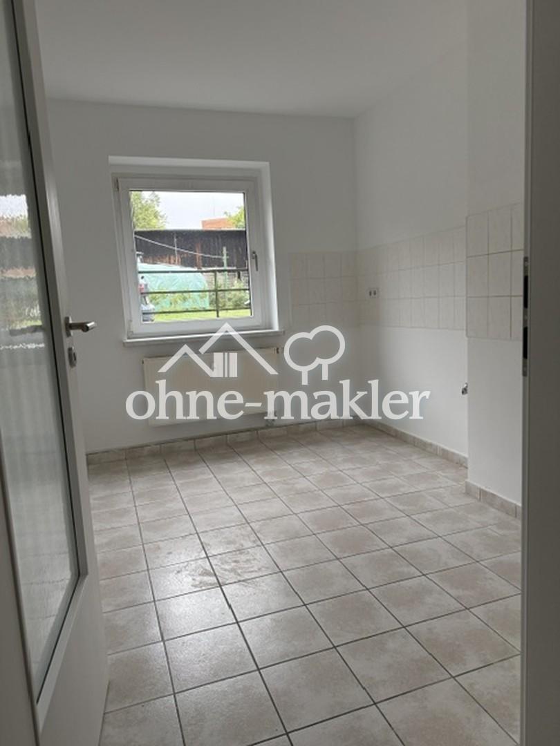 Sanierte Erdgeschosswohnung mit Terrasse - Foto 2