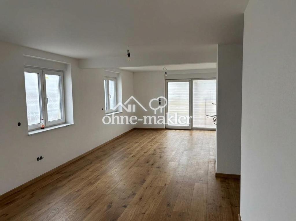 3 Zimmer EG-Wohnung mit traumhaftem Ausblick, großer Terrasse + Garten - Photo 1
