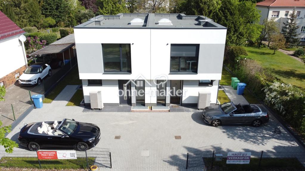 Modernes 7,5-Zimmer-Haus mit separater Einliegerwohnung, Garten & A+ - Foto 2