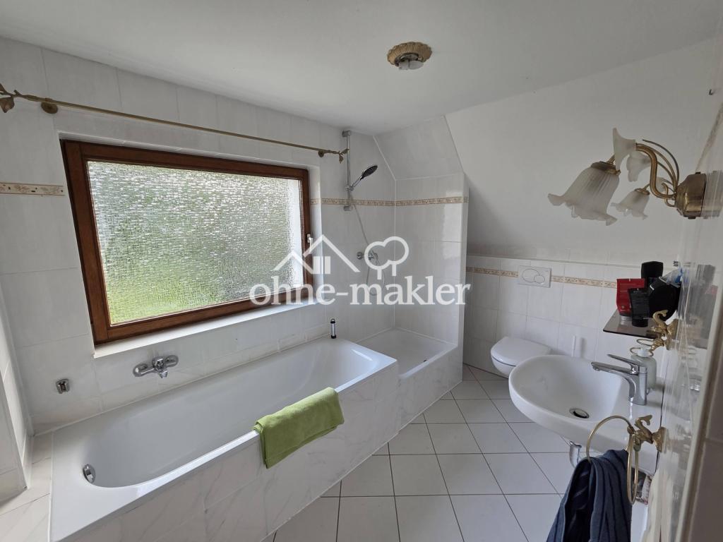 Einfamilienhaus mit großem Garten in bester Lage - Foto 3