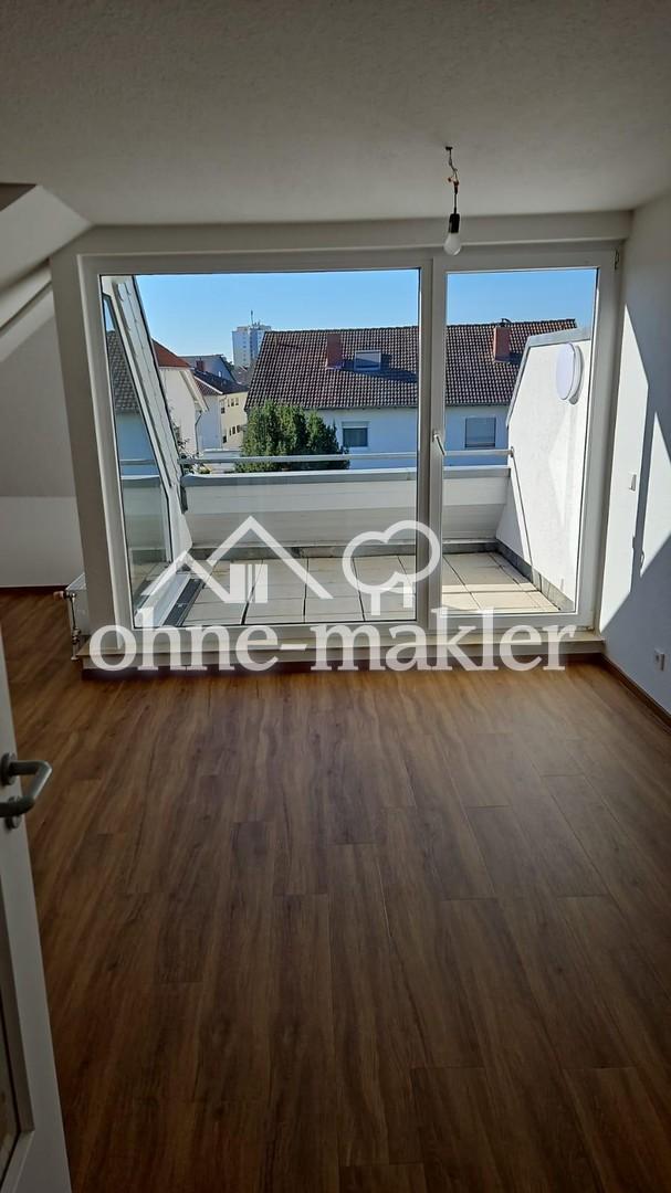 Helle 2-Zimmer-Dachgeschosswohnung mit Loggia & Tiefgarage - Foto 3