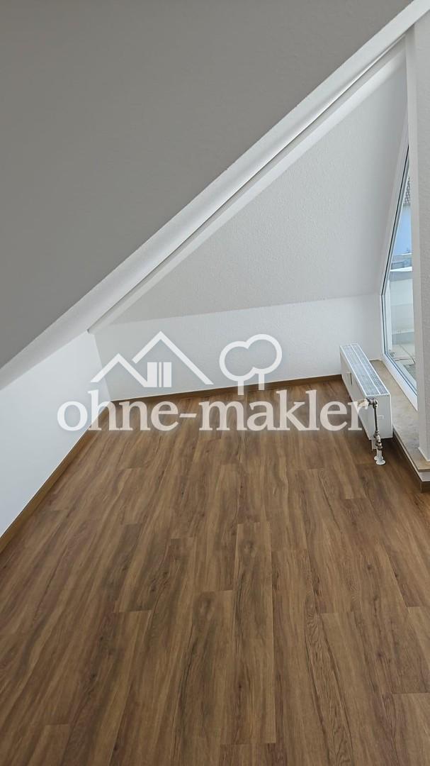 Helle 2-Zimmer-Dachgeschosswohnung mit Loggia & Tiefgarage - Foto 5