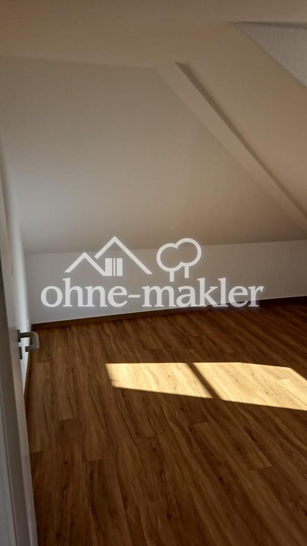 Helle 2-Zimmer-Dachgeschosswohnung mit Loggia & Tiefgarage - Foto 4