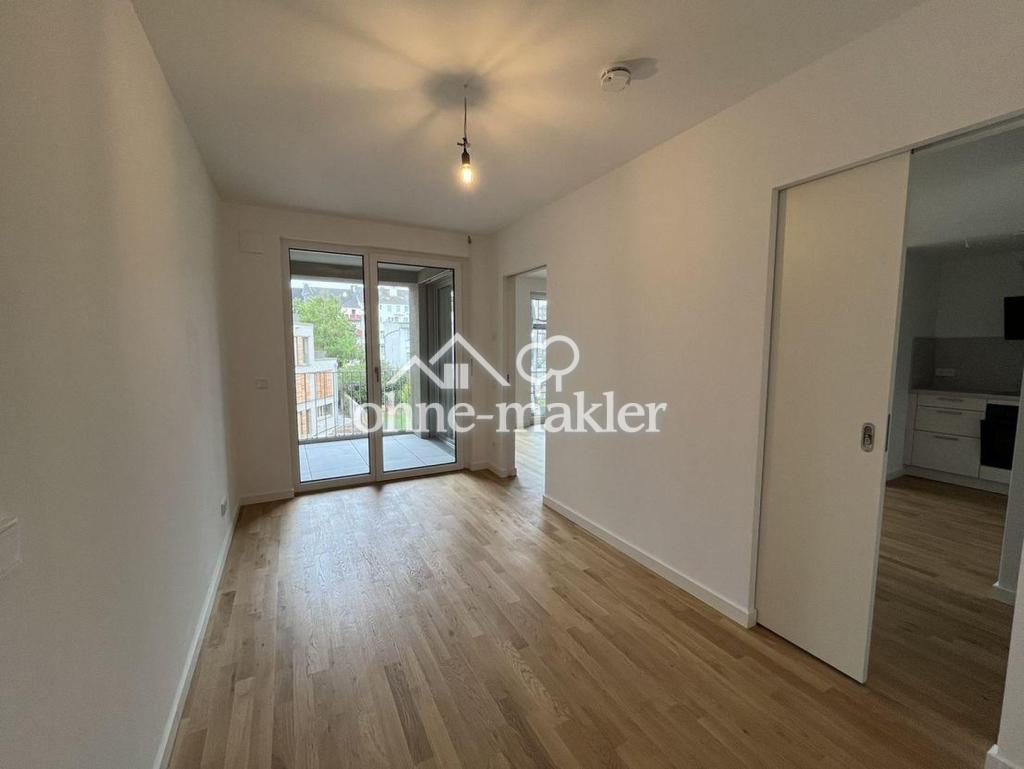 Erstbezug im Neubau! Moderne 2-Zimmer Wohnung mit QNG-Plus Siegel und Einbauküche! - Foto 2