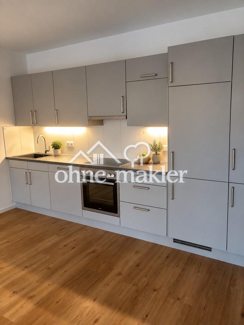 Exklusive 2-Zimmererdgeschosswohnung mit großer Sonnenterrasse und hochwertiger Einbauküche - Foto 3