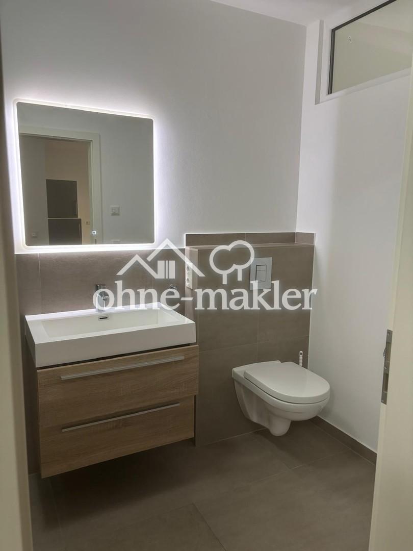 Exklusive 2-Zimmererdgeschosswohnung mit großer Sonnenterrasse und hochwertiger Einbauküche - Foto 4