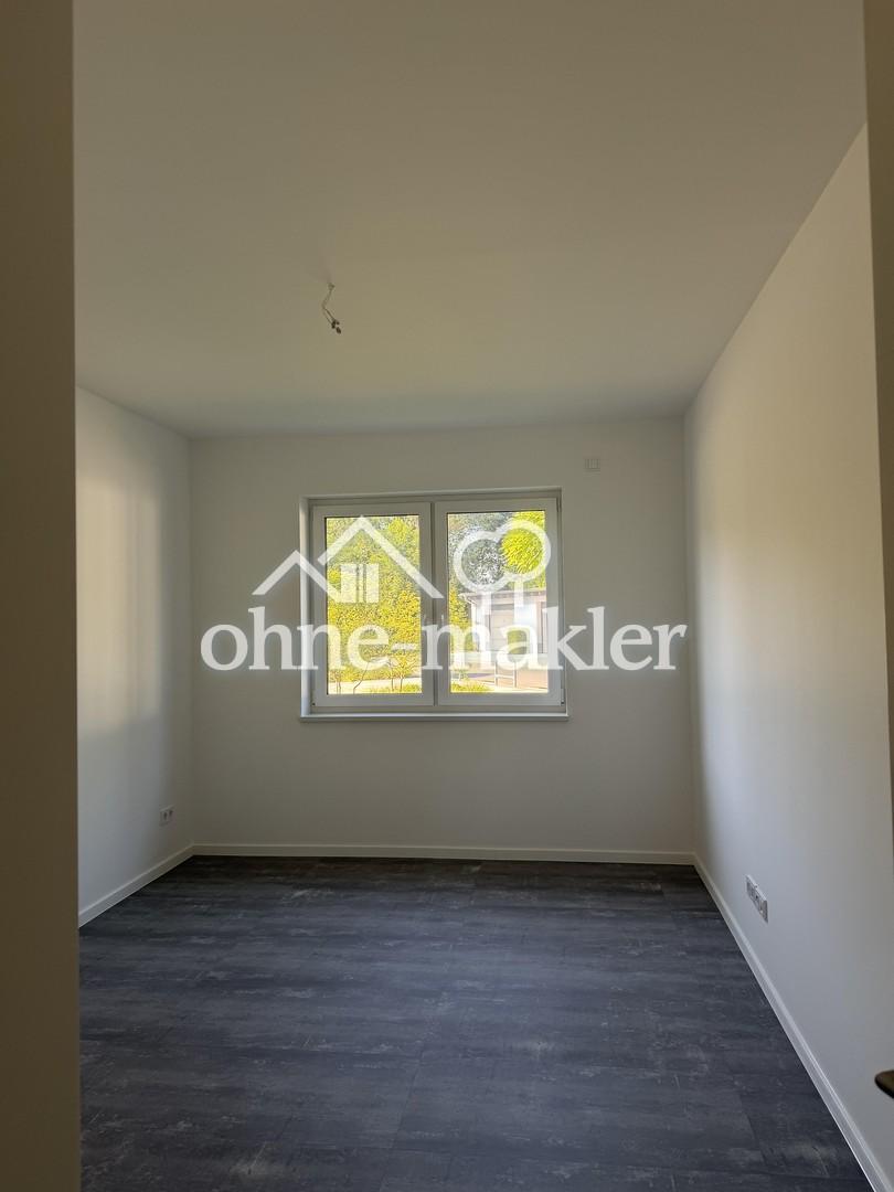 Moderne 4-Zimmer-EG-Wohnung mit überdachter Terrasse, Aufzug & Wärmepumpe - Photo 3