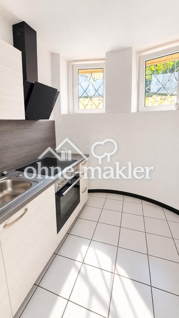 Schöne 2-Zimmer-Souterrainwohnung mit Einbauküche und Gemeinschaftsgarten - Photo 5