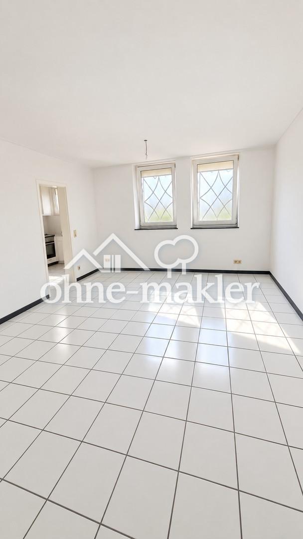 Schöne 2-Zimmer-Souterrainwohnung mit Einbauküche und Gemeinschaftsgarten - Foto 3