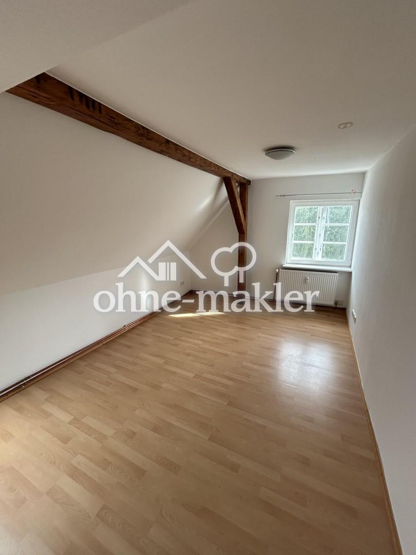 Gemütliche 2-Zimmer-Dachgeschosswohnung - Foto 4