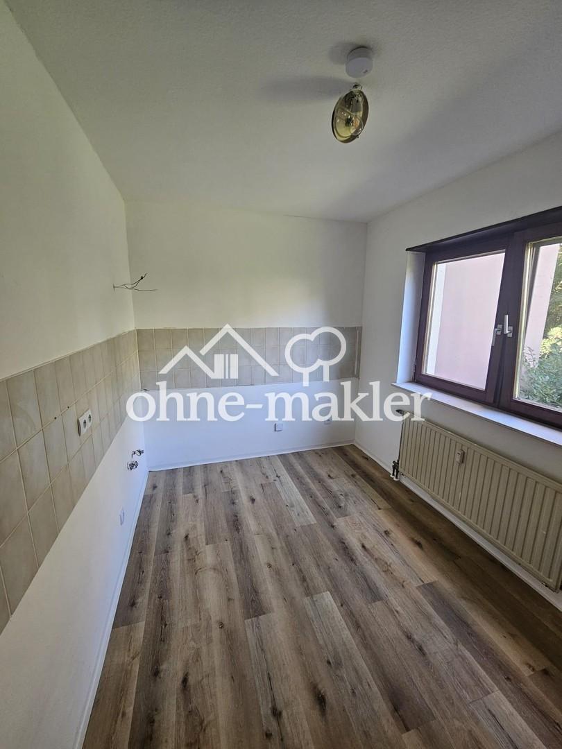 Helle 1-Zimmer-Erdgeschosswohnung mit Balkon, Einbaupotenzial & Abstellraum – Dornheimer Ring 81 - Photo 2