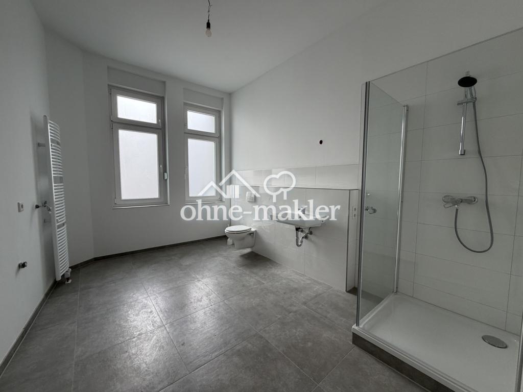 Sanierte Erdgeschosswohnung mit Terrasse - Foto 1
