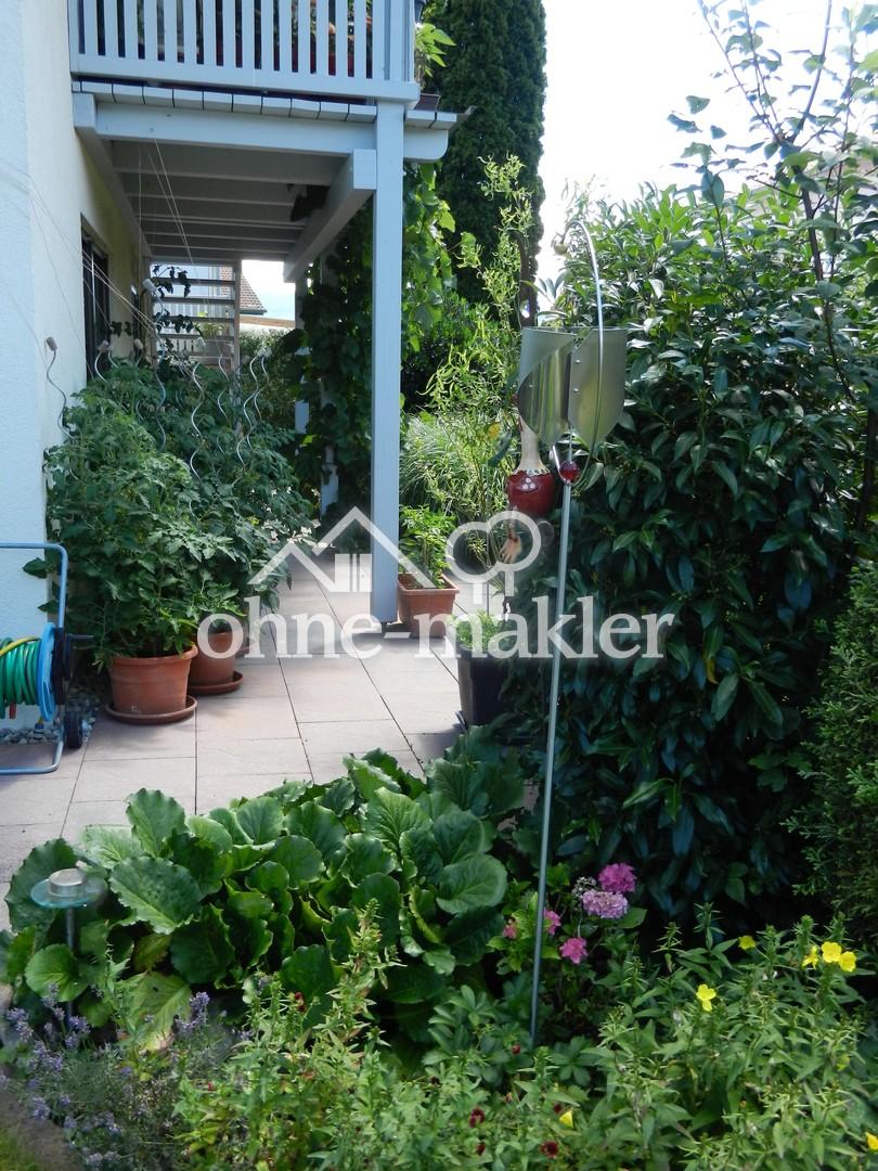 Helle und geräumige 4-Zimmer Erdgeschosswohnung mit Terrasse und Gartenanteil - Foto 1