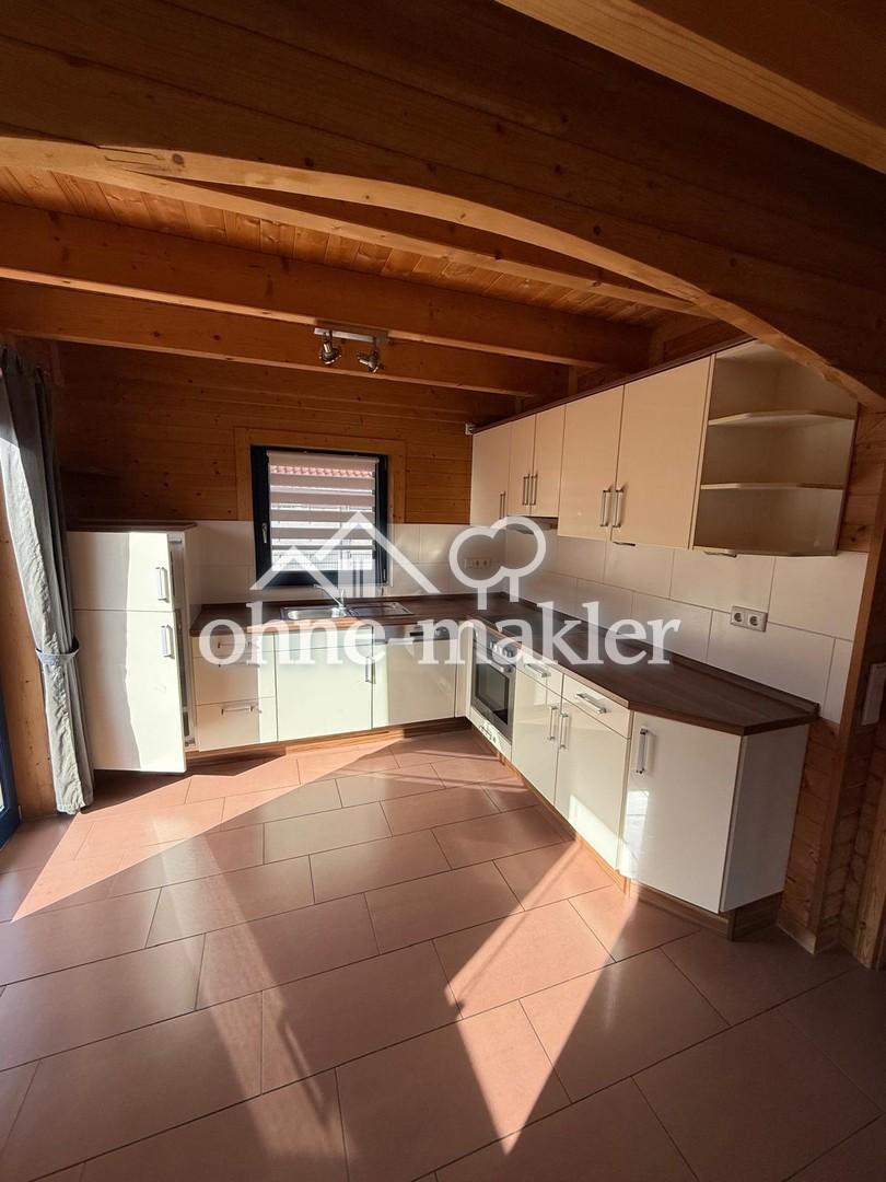 Charmantes Holzhaus mit direktem Seezugang, Garten & Balkon im Seepark Eiken - Foto 1
